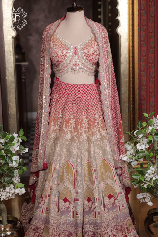 Detailed view of the scalloped mirror-work borders and geometric embroidery on the cape dupatta of the Ombre Georgette Lehenga Set.