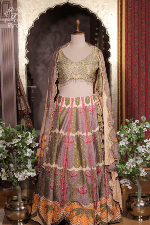 Detailed view of the embroidered scalloped border and sheer drape of the cape dupatta on the Printed Silk Lehenga Set.