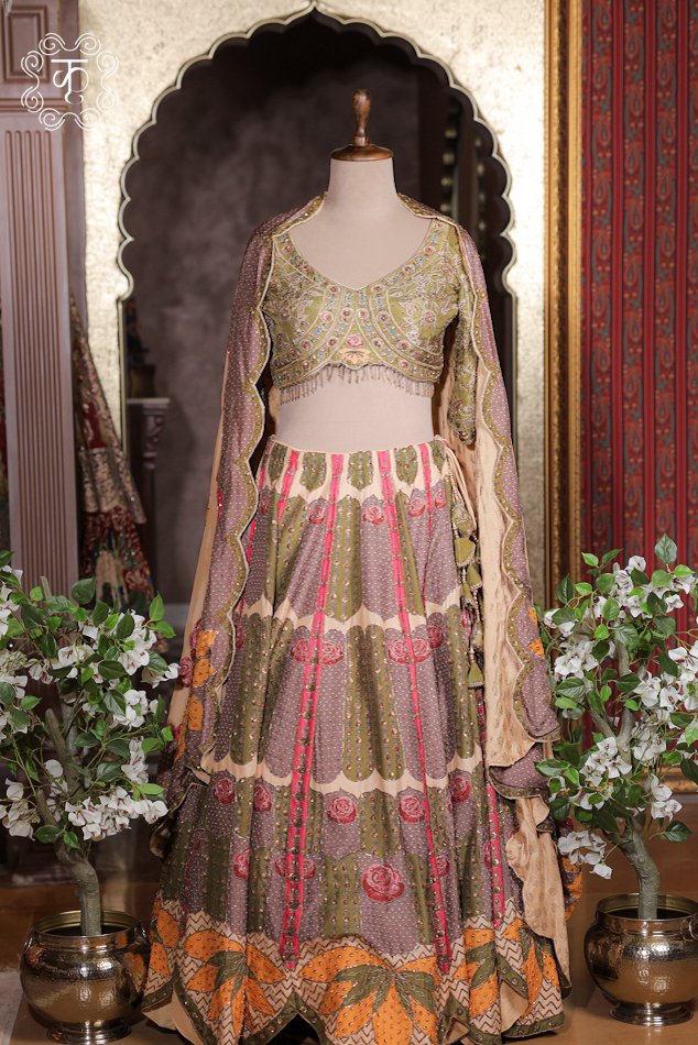 Detailed view of the embroidered scalloped border and sheer drape of the cape dupatta on the Printed Silk Lehenga Set.