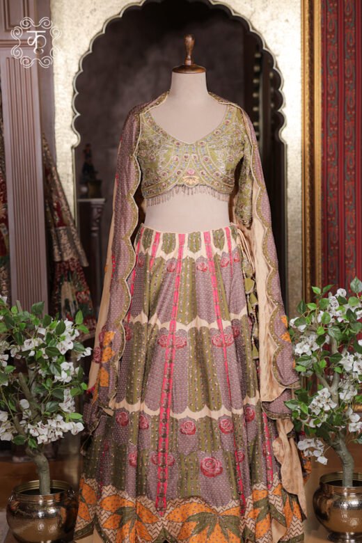 Close-up of the botanical rose prints, abstract geometric trellises, and side hem latkan tie-ups on the Printed Silk Lehenga Set skirt.