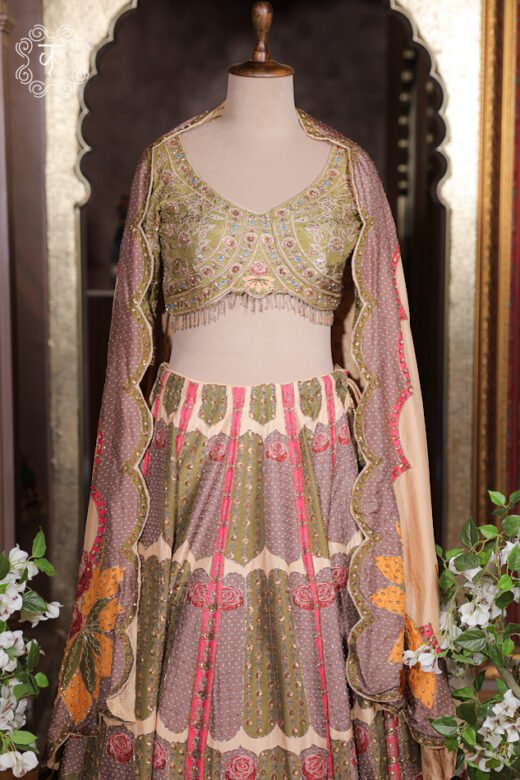 Printed Silk Lehenga Set featuring botanical rose prints, an embroidered V-neck choli, and a cape dupatta drape from Kridhaa.