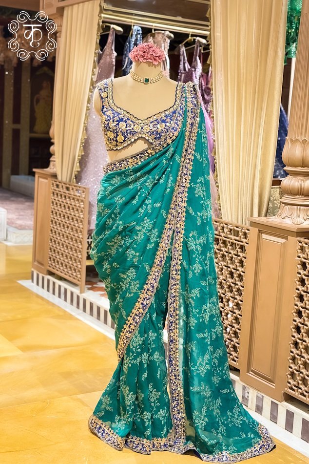 Teal green designer saree with floral print and royal blue embroidered border - Kridhaa