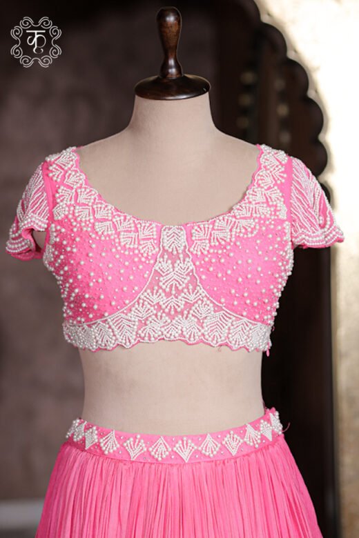 Micro crush pleat fabric texture of bubblegum pink georgette lehenga skirt with pearl embroidered waistband.