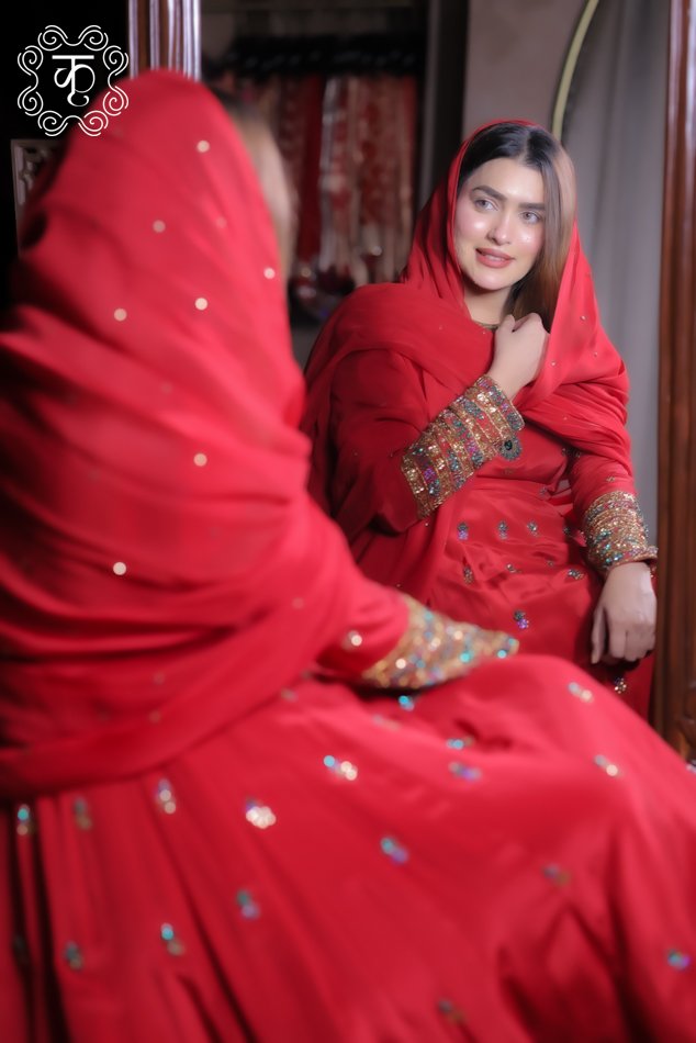 Red festive embroidered Anarkali suit with detailed sleeves