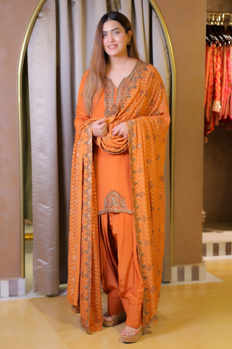 Orange hand embroidered designer suit set with matching dupatta
