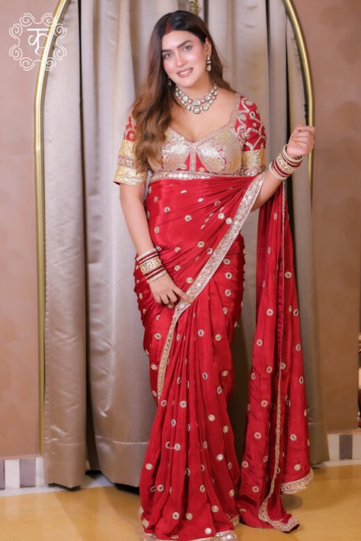 Red gold designer saree with embellished blouse