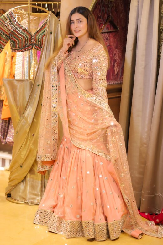 Peach Mirror Work Lehenga Set with Embroidered Net Dupatta